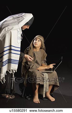 Stock Image - young jesus and a high priest. Fotosearch