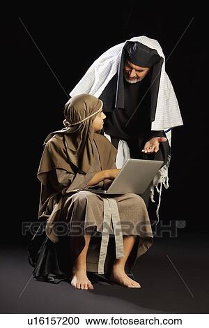 Stock Image - young jesus and a high priest. Fotosearch