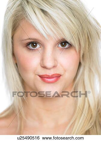 Stock Photograph - Close Studio Portrait Of Blonde Teenage Girl. Fotosearch