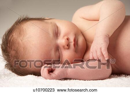 Close Up Of Baby Sleeping On Towel View Large Photo Image Stock Image - Close Up Of Baby Sleeping On Towel. Fotosearch