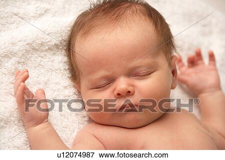 Close Up Of Baby Sleeping On Towel View Large Photo Image Stock Photo - Close Up Of Baby Sleeping On Towel. Fotosearch