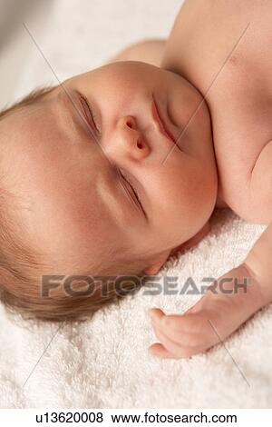 Close Up Of Baby Sleeping On Towel View Large Photo Image Stock Photo - Close Up Of Baby Sleeping On Towel. Fotosearch