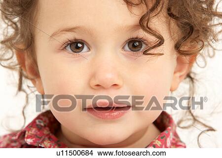 Close Up Studio Portrait Of Smiling Young Girl View Large Photo Image Picture - Close Up Studio Portrait Of Smiling Young Girl. Fotosearch
