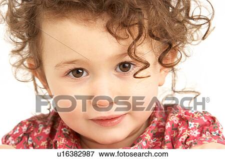 Close Up Studio Portrait Of Smiling Young Girl View Large Photo Image Stock Photo - Close Up Studio Portrait Of Smiling Young Girl. Fotosearch