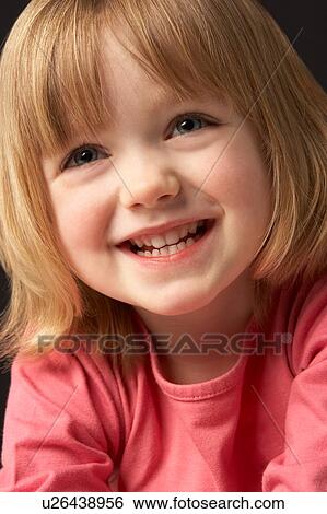 Close Up Studio Portrait Of Smiling Young Girl View Large Photo Image Stock Photograph - Close Up Studio Portrait Of Smiling Young Girl. Fotosearch