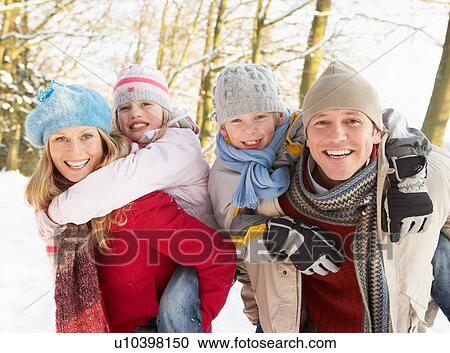 Family Having Fun Snowy Woodland View Large Photo Image Stock Image - Family Having Fun Snowy Woodland. Fotosearch