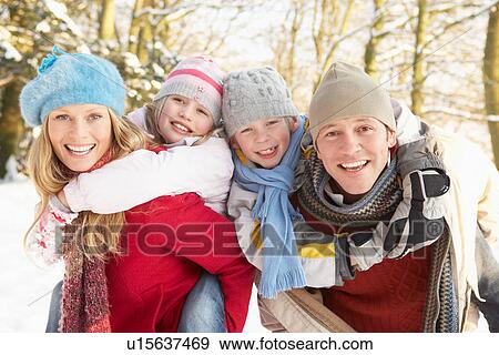 Family Having Fun Snowy Woodland View Large Photo Image Stock Photo - Family Having Fun Snowy Woodland. Fotosearch