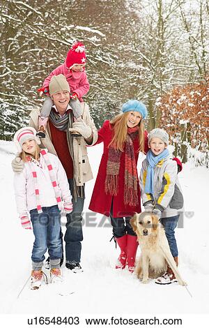 Family Walking Through Snowy Woodland View Large Photo Image Stock Image - Family Walking Through Snowy Woodland. Fotosearch
