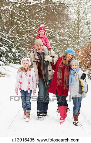 Family Walking Through Snowy Woodland View Large Photo Image Stock Photography - Family Walking Through Snowy Woodland. Fotosearch