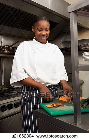 Female Chef Preparing Vegetables In Restaurant Kitchen View Large Photo Image Picture - Female Chef Preparing Vegetables In Restaurant Kitchen. Fotosearch
