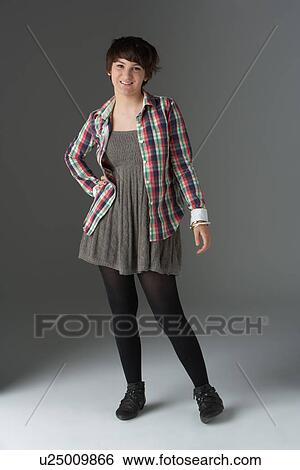 Full Length Studio Portrait Of Teenage Girl View Large Photo Image Stock Photograph - Full Length Studio Portrait Of Teenage Girl. Fotosearch