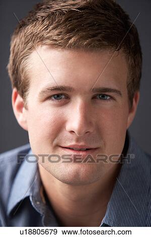 Head And Shoulders Portrait Of Young Man In Studio View Large Photo Image Stock Photo - Head And Shoulders Portrait Of Young Man In Studio. Fotosearch