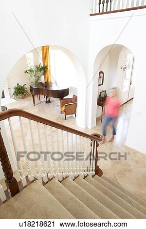 House Interior Showing Staircase And Abstract Female Figure View Large Photo Image Stock Image - House Interior Showing Staircase And Abstract Female Figure. Fotosearch
