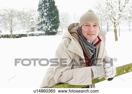 Man Standing Outside In Snowy Landscape View Large Photo Image Stock Photography - Man Standing Outside In Snowy Landscape. Fotosearch