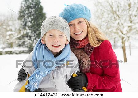 Mother And Son Standing Outside In Snowy Landscape View Large Photo Image Stock Image - Mother And Son Standing Outside In Snowy Landscape. Fotosearch