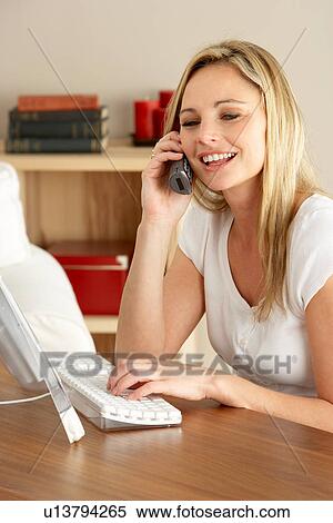 Mother At Home Using Computer View Large Photo Image Stock Photography - Mother At Home Using Computer. Fotosearch