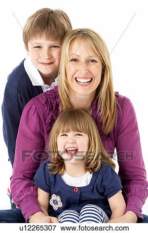 Mother With 2 Young Children In Studio View Large Photo Image Stock Photo - Mother With 2 Young Children In Studio. Fotosearch