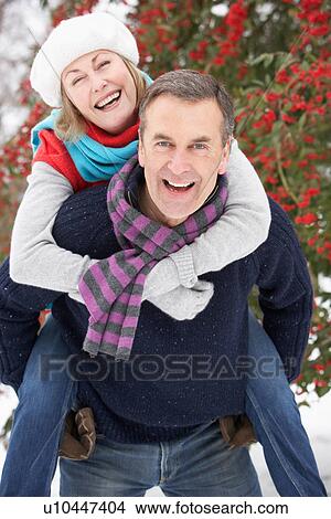 Senior Couple Outside In Snowy Landscape View Large Photo Image Picture - Senior Couple Outside In Snowy Landscape. Fotosearch