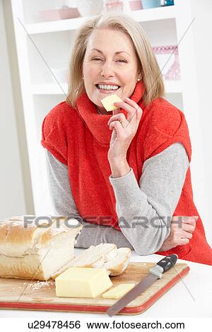 Senior Woman Making Sandwich In Kitchen View Large Photo Image Stock Photograph - Senior Woman Making Sandwich In Kitchen. Fotosearch