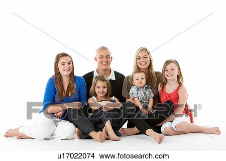 Shot Of Family Group Sitting In Studio View Large Photo Image Picture - Shot Of Family Group Sitting In Studio. Fotosearch