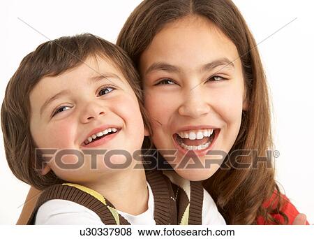Studio Portrait Of Brother And Sister View Large Photo Image Stock Photo - Studio Portrait Of Brother And Sister. Fotosearch
