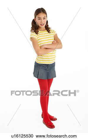 Studio Portrait Of Defiant Young Girl View Large Photo Image Stock Image - Studio Portrait Of Defiant Young Girl. Fotosearch