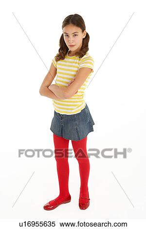 Stock Photography - Studio Portrait Of Defiant Young Girl. Fotosearch