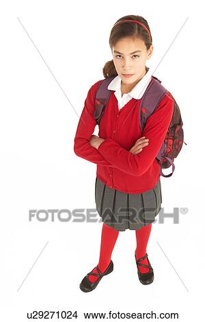 Picture - Studio Portrait Of Female Student In Uniform With Backpack. Fotosearch