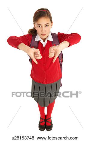 Stock Photo - Studio Portrait Of Female Student In Uniform With Backpack. Fotosearch