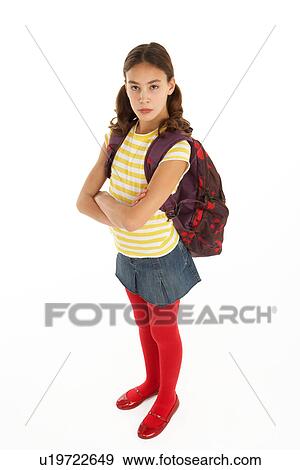 Stock Photo - Studio Portrait Of Female Student With Backpack. Fotosearch