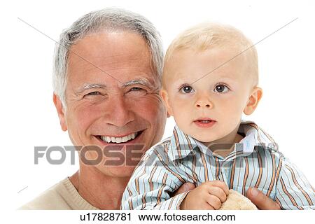 Studio Portrait Of Grandfather Holding Grandson View Large Photo Image Stock Image - Studio Portrait Of Grandfather Holding Grandson. Fotosearch