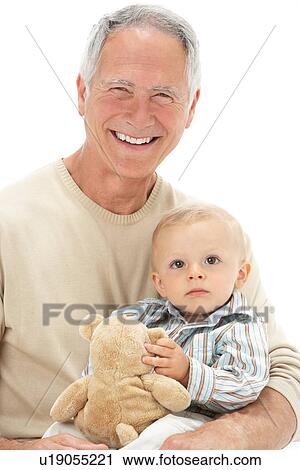 Studio Portrait Of Grandfather Holding Grandson With Teddy Bear View Large Photo Image Stock Image - Studio Portrait Of Grandfather Holding Grandson With Teddy Bear. Fotosearch