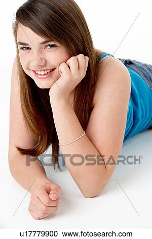 Studio Portrait Of Happy Teenage Girl View Large Photo Image Stock Image - Studio Portrait Of Happy Teenage Girl. Fotosearch