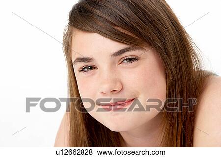 Stock Photo - Studio Portrait Of Happy Teenage Girl. Fotosearch