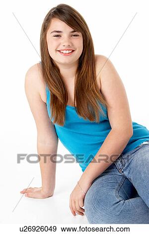 Studio Portrait Of Happy Teenage Girl View Large Photo Image Stock Photo - Studio Portrait Of Happy Teenage Girl. Fotosearch