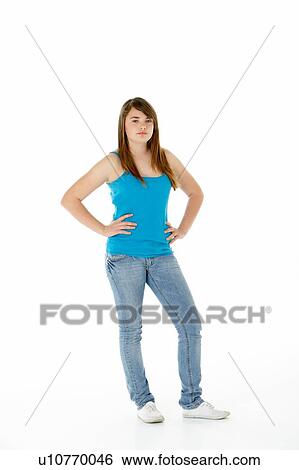 Stock Photograph - Studio Portrait Of Happy Teenage Girl. Fotosearch