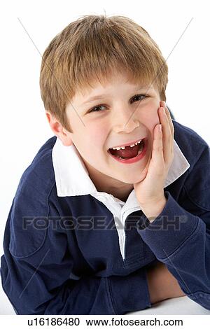 Studio Portrait Of Laughing Young Boy View Large Photo Image Stock Image - Studio Portrait Of Laughing Young Boy. Fotosearch