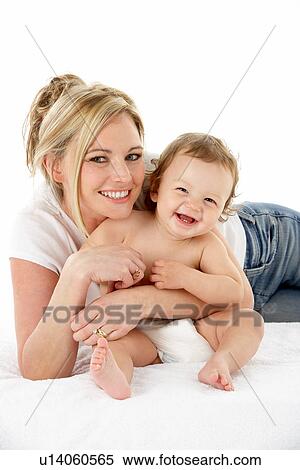 Studio Portrait Of Mother With Young Baby Boy View Large Photo Image Stock Photography - Studio Portrait Of Mother With Young Baby Boy. Fotosearch