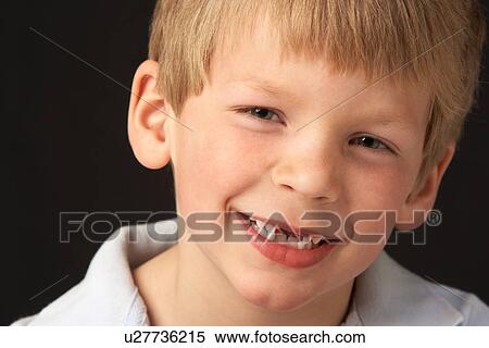 Studio Portrait Of Smiling Boy View Large Photo Image Stock Photography - Studio Portrait Of Smiling Boy. Fotosearch