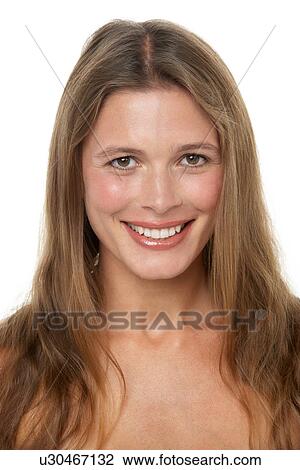 Stock Image - Studio Portrait Of Smiling Young Woman. Fotosearch