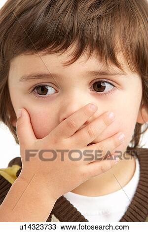 Studio Portrait Of Young Boy Looking Guilty View Large Photo Image Stock Image - Studio Portrait Of Young Boy Looking Guilty. Fotosearch