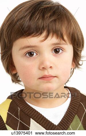 Stock Image - Studio Portrait Of Young Boy. Fotosearch