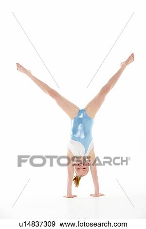 Stock Photo - Studio Portrait Of Young Female Gymnast. Fotosearch