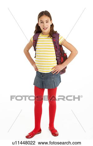 Stock Image - Studio Portrait Of Young Girl With Backpack. Fotosearch