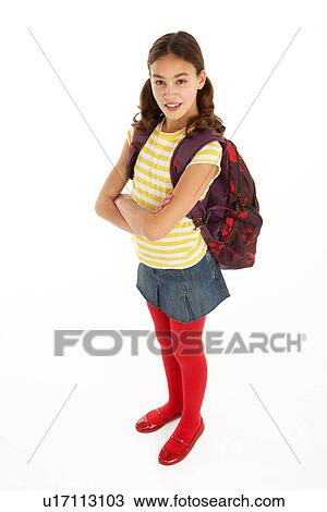 Stock Image - Studio Portrait Of Young Girl With Backpack. Fotosearch
