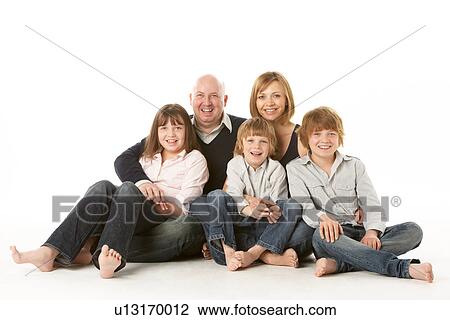 Studio Shot Of Family Group Sitting In Studio View Large Photo Image Stock Image - Studio Shot Of Family Group Sitting In Studio. Fotosearch