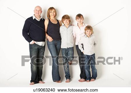 Studio Shot Of Family Group Standing In Studio View Large Photo Image Stock Image - Studio Shot Of Family Group Standing In Studio. Fotosearch