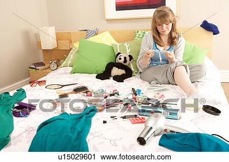 Teenage Girl In Untidy Bedroom Waxing Legs View Large Photo Image Stock Image - Teenage Girl In Untidy Bedroom Waxing Legs. Fotosearch