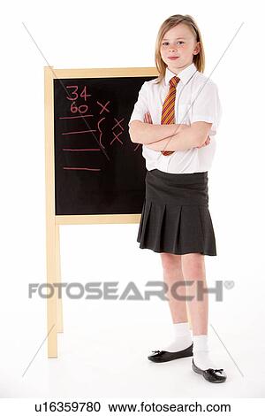 Thoughtful Female Student Wearing Uniform Next To Blackboard View Large Photo Image Stock Image - Thoughtful Female Student Wearing Uniform Next To Blackboard. Fotosearch