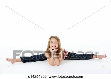 Stock Photograph - Young Girl In Gymnastic Pose Doing Splits. Fotosearch